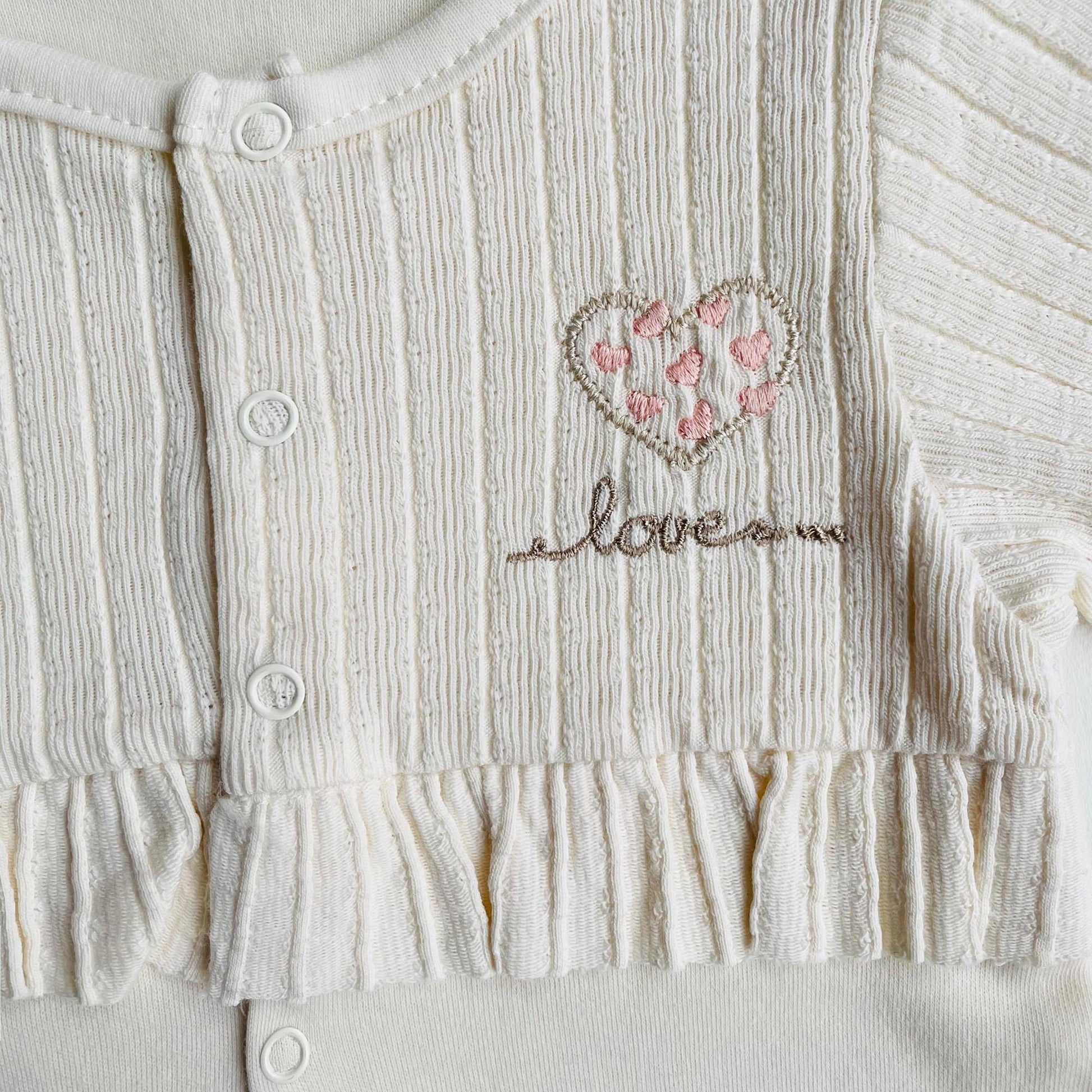 Cream Cotton Baby Girl One Piece Outfit: Button Down heart Embroidery Detail Footie